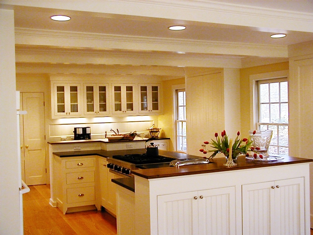 traditional_painted_cabinetry_with_inset_doors,_beadboard_panels_and_glass_wall_cabinets-828469-edited.jpg