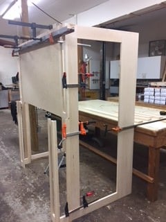 custom fireplace surround framework with legs, breastboard and returns