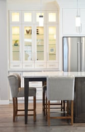 lighted glass display cabinet in traditional kitchen